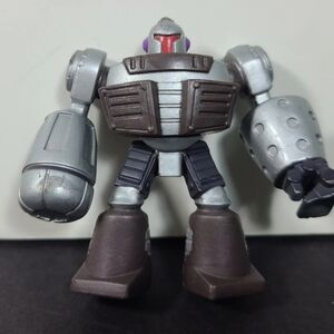 Silver and Brown Action Figures with Transformable Features